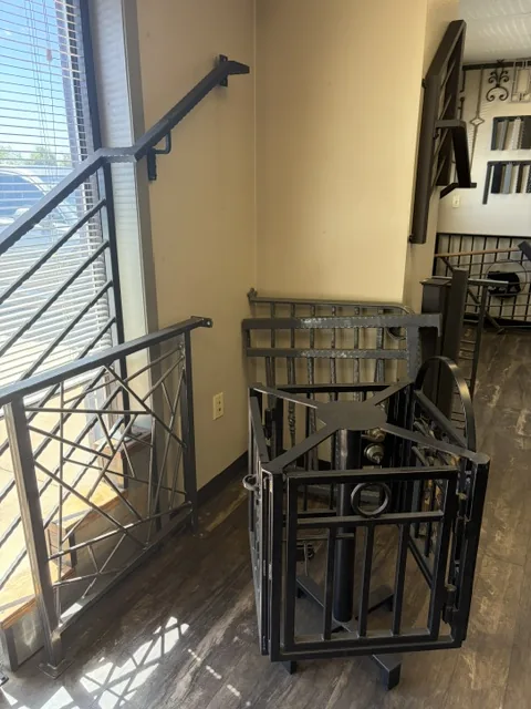 Custom iron railings and fabrication work inside The Ornamental Man showroom