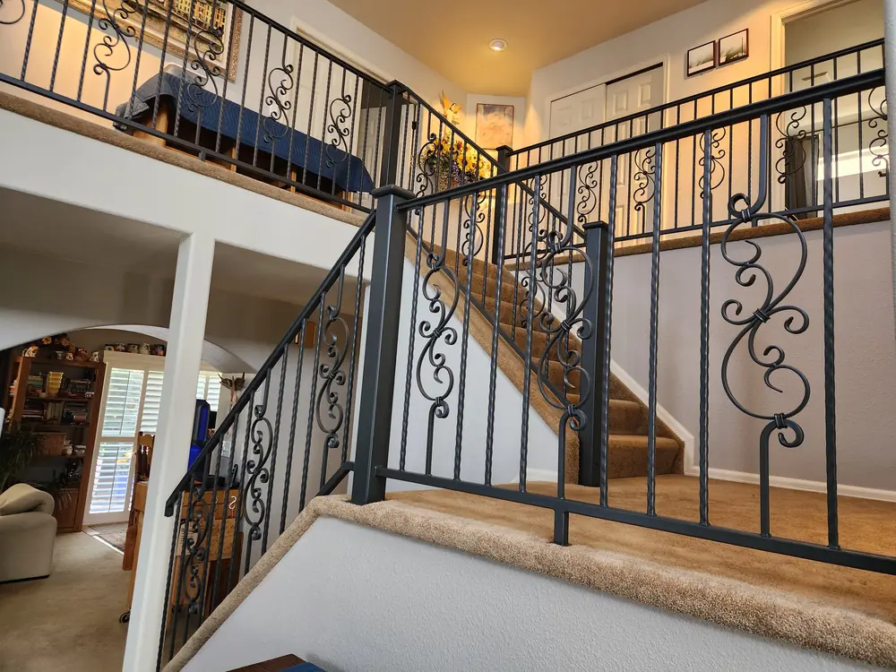 Finished ornamental staircase railing in luxury home