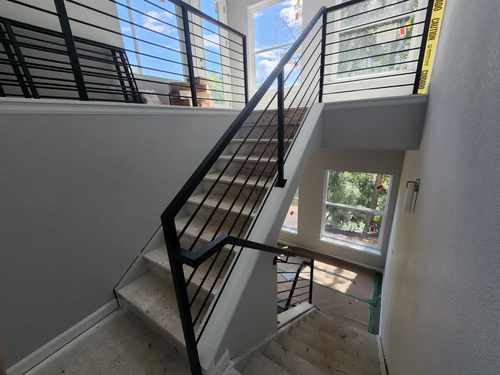 Custom curved iron staircase